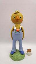 Easter or Spring folk art chick wearing light blue overalls