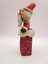 Christmas folk art cute Santa coming out of chimney