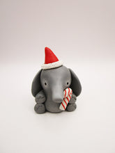 Christmas folk art small elephant with Santa hat