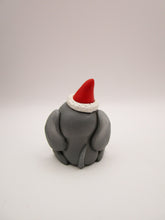 Christmas folk art small elephant with Santa hat