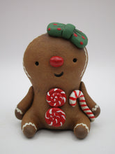 Christmas folk art cute sitting Gingerbread girl