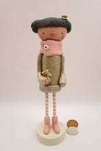 Christmas folk art girl in champagne shimmer sweater with wood legs