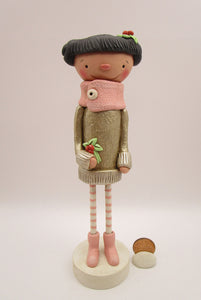 Christmas folk art girl in champagne shimmer sweater with wood legs