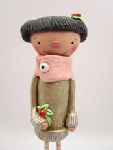 Christmas folk art girl in champagne shimmer sweater with wood legs