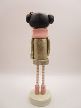 Christmas folk art girl in champagne shimmer sweater with wood legs