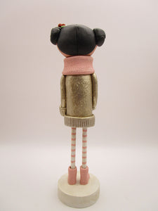Christmas folk art girl in champagne shimmer sweater with wood legs
