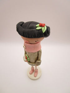 Christmas folk art girl in champagne shimmer sweater with wood legs