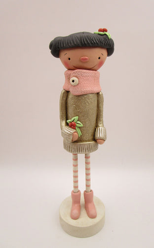 Christmas folk art girl in champagne shimmer sweater with wood legs