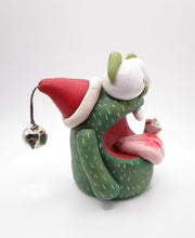 Christmas candy cane monster with bell trimmed hat