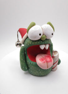 Christmas candy cane monster with bell trimmed hat