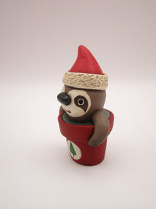 Christmas small sloth in pot wearing Santa hat