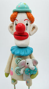 Circus Clown holding tiny elephant toy excellent colors! misc