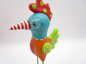 Spring folk art colorful chicken like bird