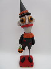 Halloween folk art creepy character with trick or treat bucket