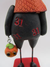 Halloween folk art creepy character with trick or treat bucket