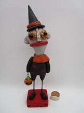 Halloween folk art creepy character with trick or treat bucket