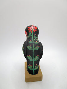 Paper clay folk art style black bird with orange floral and leaf designs misc