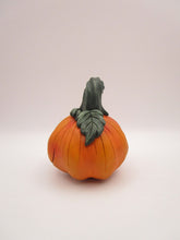 Halloween cute orange pumpkin character with stem