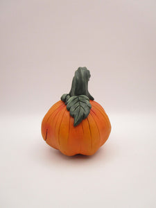 Halloween cute orange pumpkin character with stem