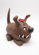 Wacky character cute and frightful big brown dog with spiked teeth