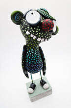 Monster wacky character WOW black with colorful polka dots and SNEAKERS