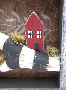 Collage style 5 x 5 wood frame with driftwood piece and two wooden houses misc