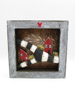 Collage style 5 x 5 wood frame with driftwood piece and two wooden houses misc