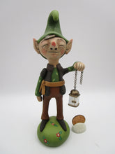 Christmas woodland ELF holding lantern