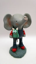 Elephant in overalls holding a monster CUTE! misc