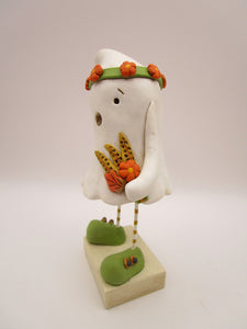 Halloween folk art ghost with floral headband and fall bouquet