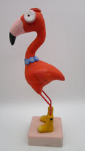 Spring folk art FLAMINGO bird wearing yellow rain boots