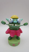 Easter folk art or Spring folk art monster in flower costume