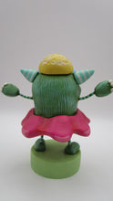 Easter folk art or Spring folk art monster in flower costume