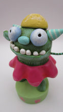 Easter folk art or Spring folk art monster in flower costume