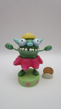 Easter folk art or Spring folk art monster in flower costume