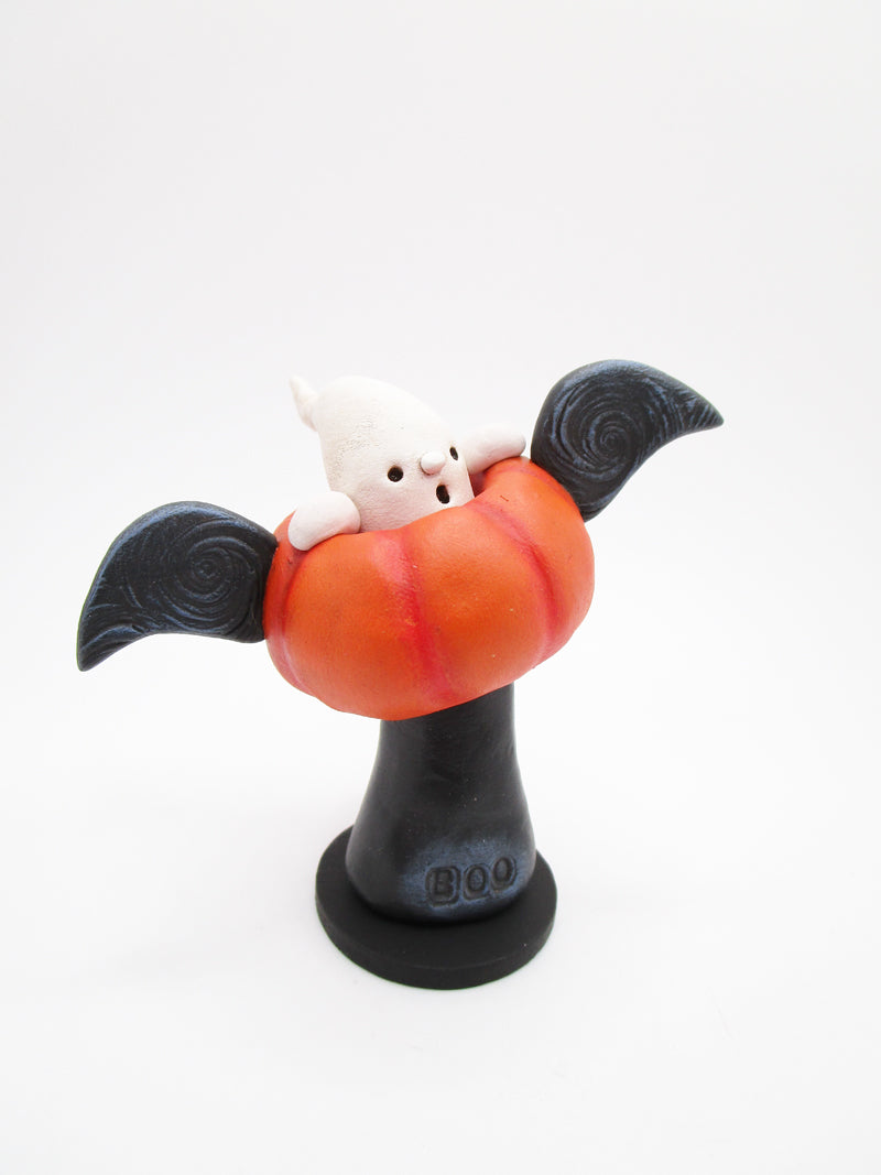 Halloween folk art flying pumpkin with ghost rider 