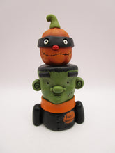 Halloween folk art Frankenstein and masked pumpkin man