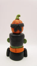 Halloween folk art Frankenstein and masked pumpkin man