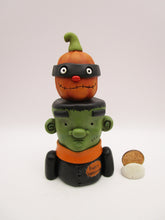 Halloween folk art Frankenstein and masked pumpkin man