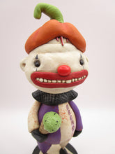Halloween folk art creepy clown named "freak" with ice cream cone