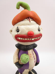 Halloween folk art creepy clown named "freak" with ice cream cone