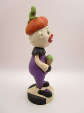 Halloween folk art creepy clown named "freak" with ice cream cone