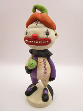 Halloween folk art creepy clown named "freak" with ice cream cone