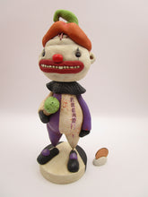 Halloween folk art creepy clown named "freak" with ice cream cone