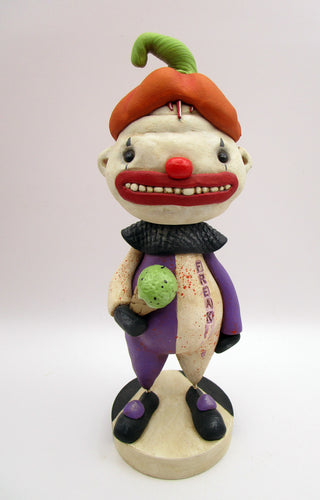 Halloween folk art creepy clown named 