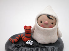 Halloween scene with ghost boy and snake and spider cute!