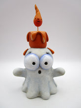 Halloween folk art ghost with drippy candle on his head