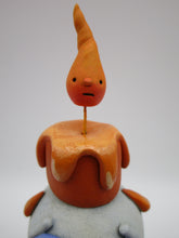 Halloween folk art ghost with drippy candle on his head