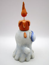 Halloween folk art ghost with drippy candle on his head