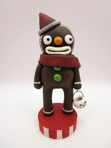 Christmas gingerbread man with snowman bucket